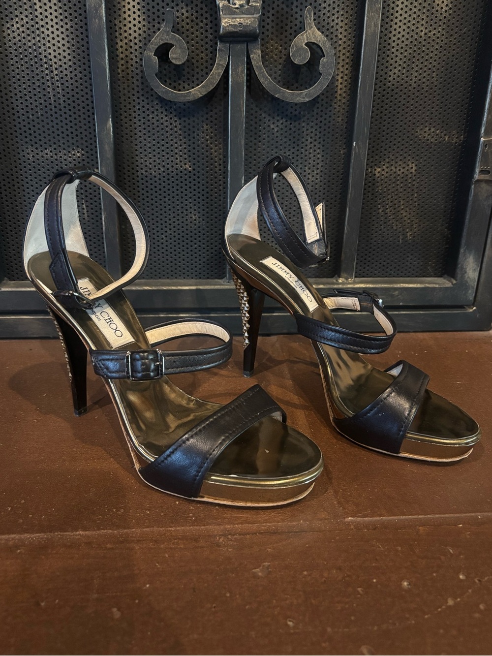 Jimmy Choo Black and Gold Leather Stiletto heels